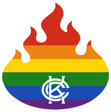 Rainbow flag with a KCC logo in the center, die-cut in the shape of a flame.