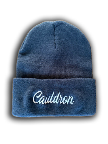 Navy beanie with 'Cauldron' script embroidery